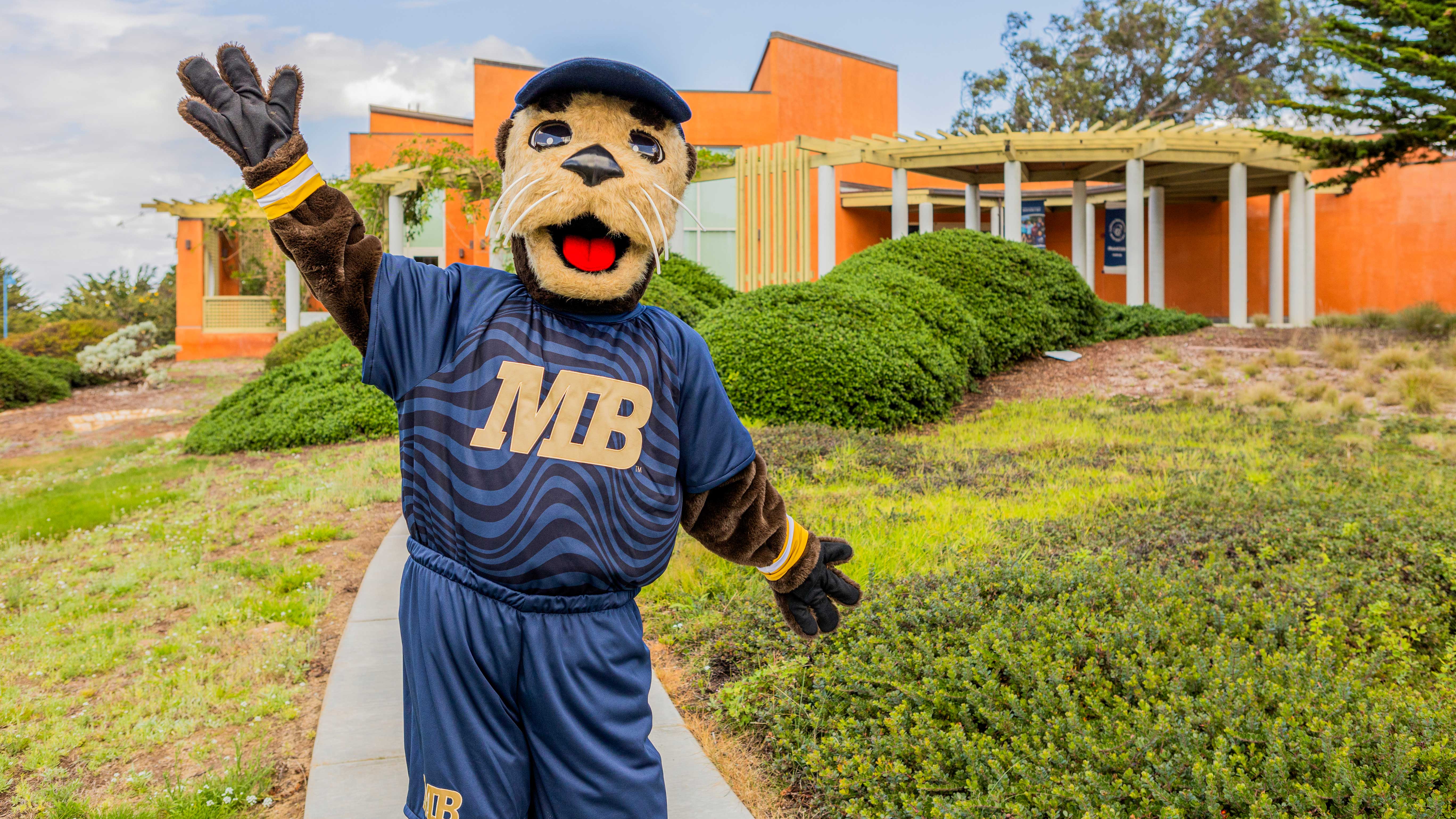 Mascot with his arms out