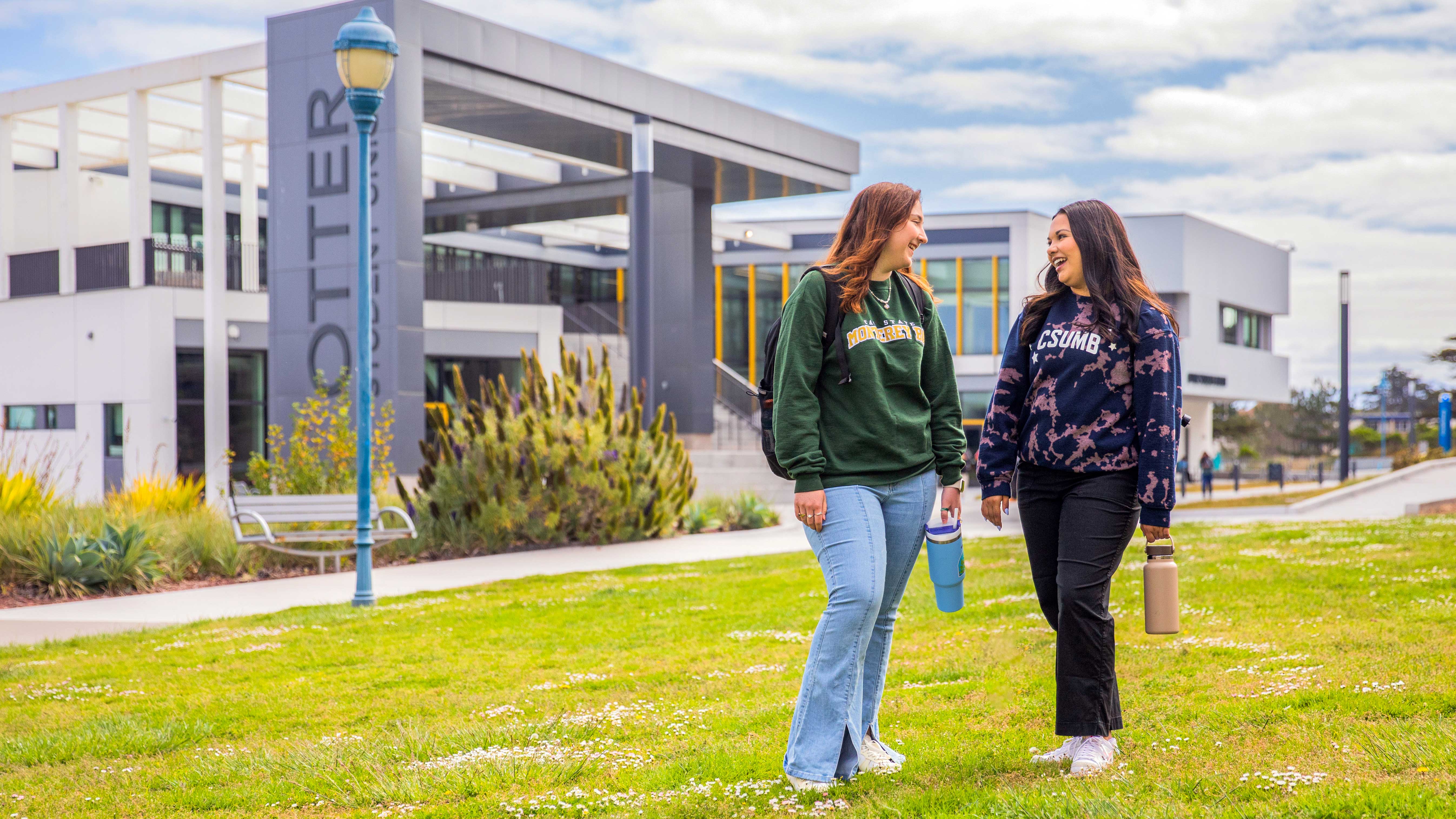 two students talking outside
