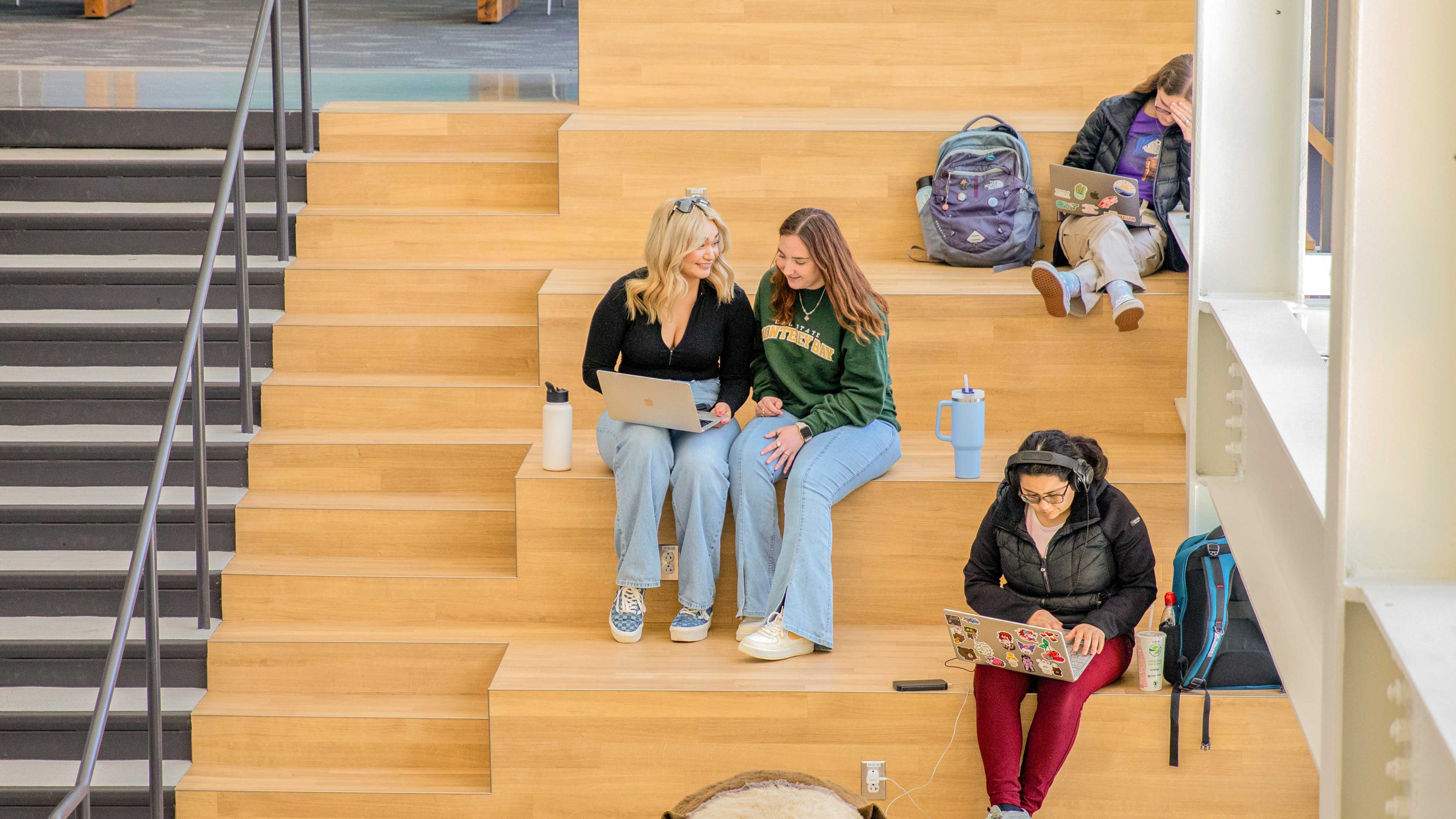 students sitting on the stairs